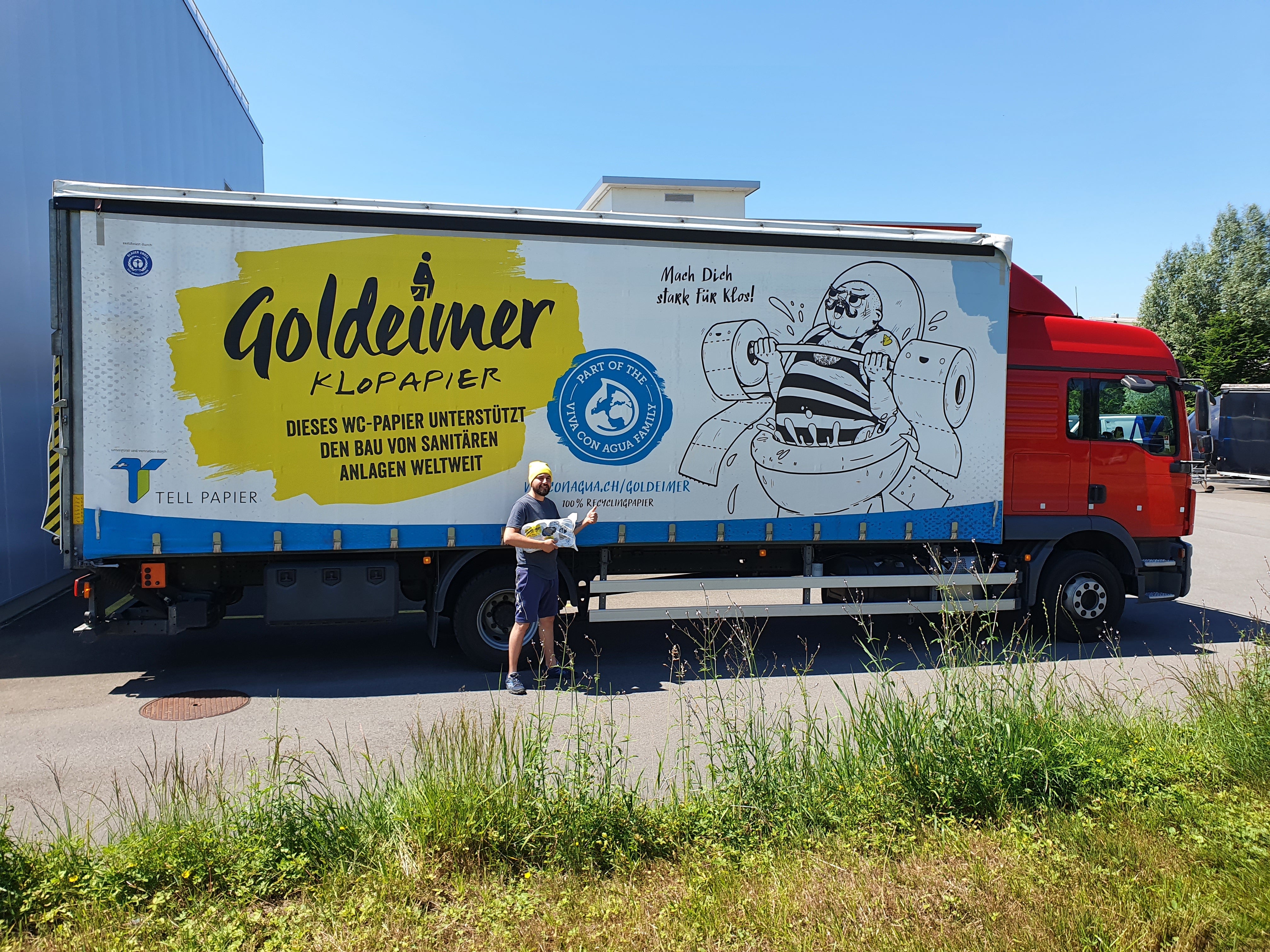 LKW mit Goldeimer Klopapier